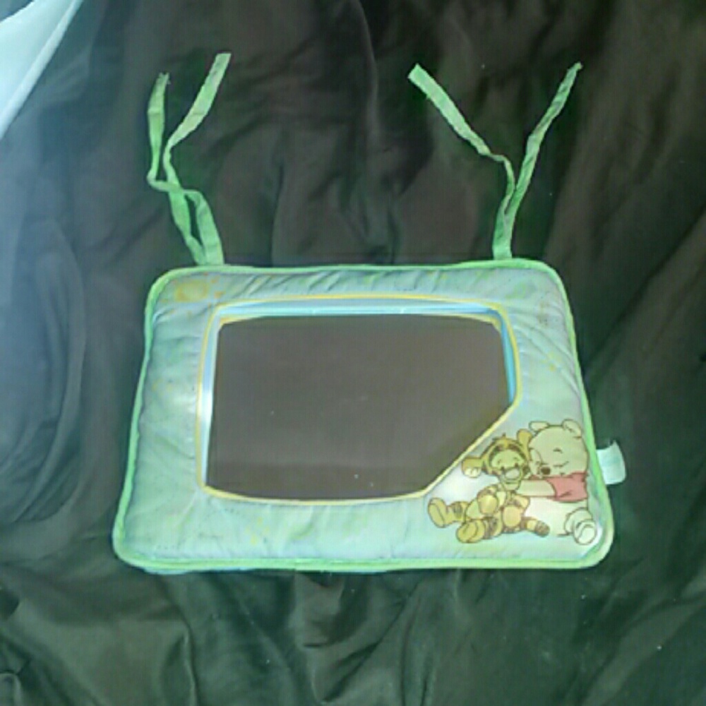 Whinnie the pooh mirror that ties on crib